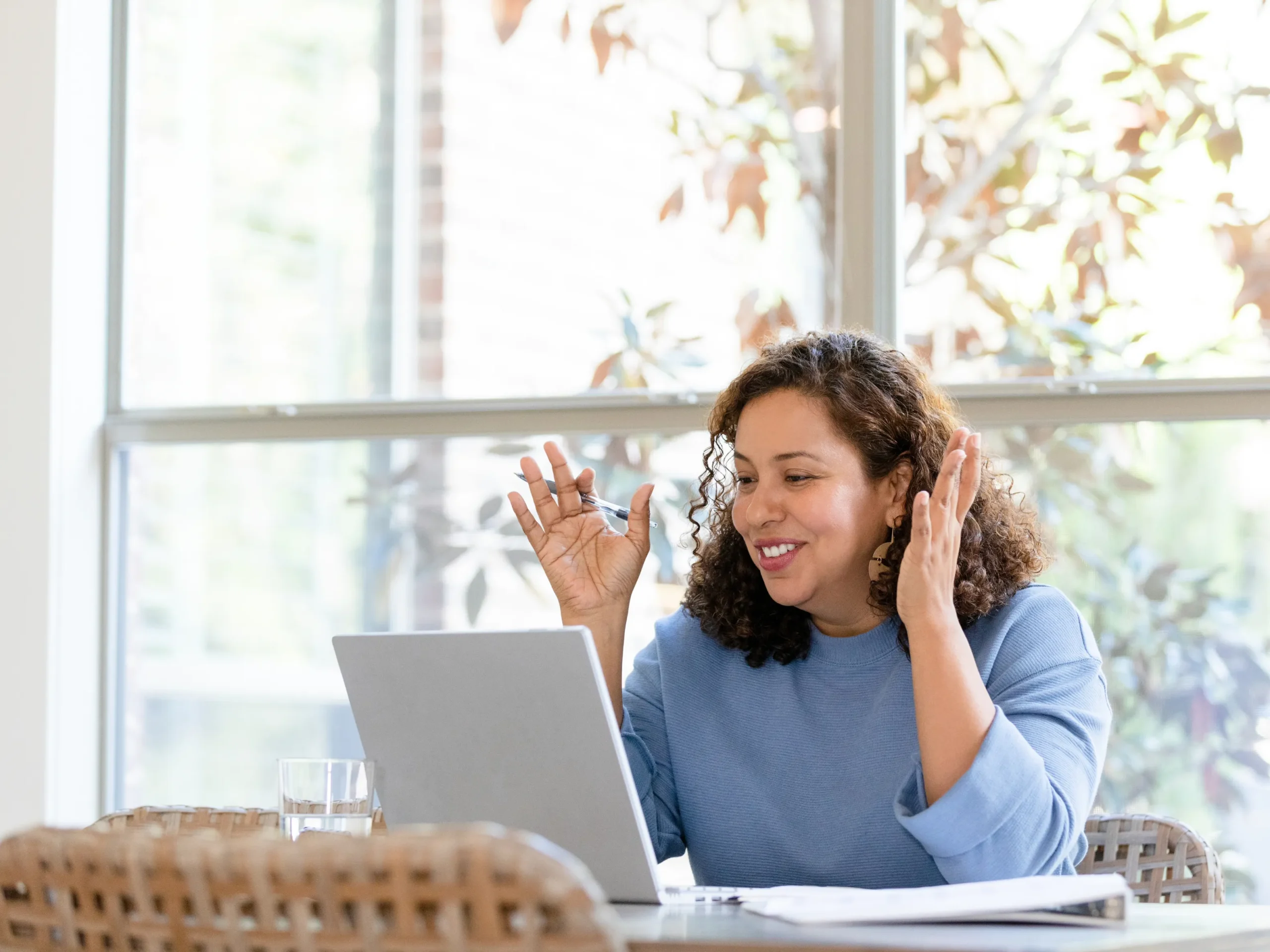 connecting with your support team - lady having a virtual meeting