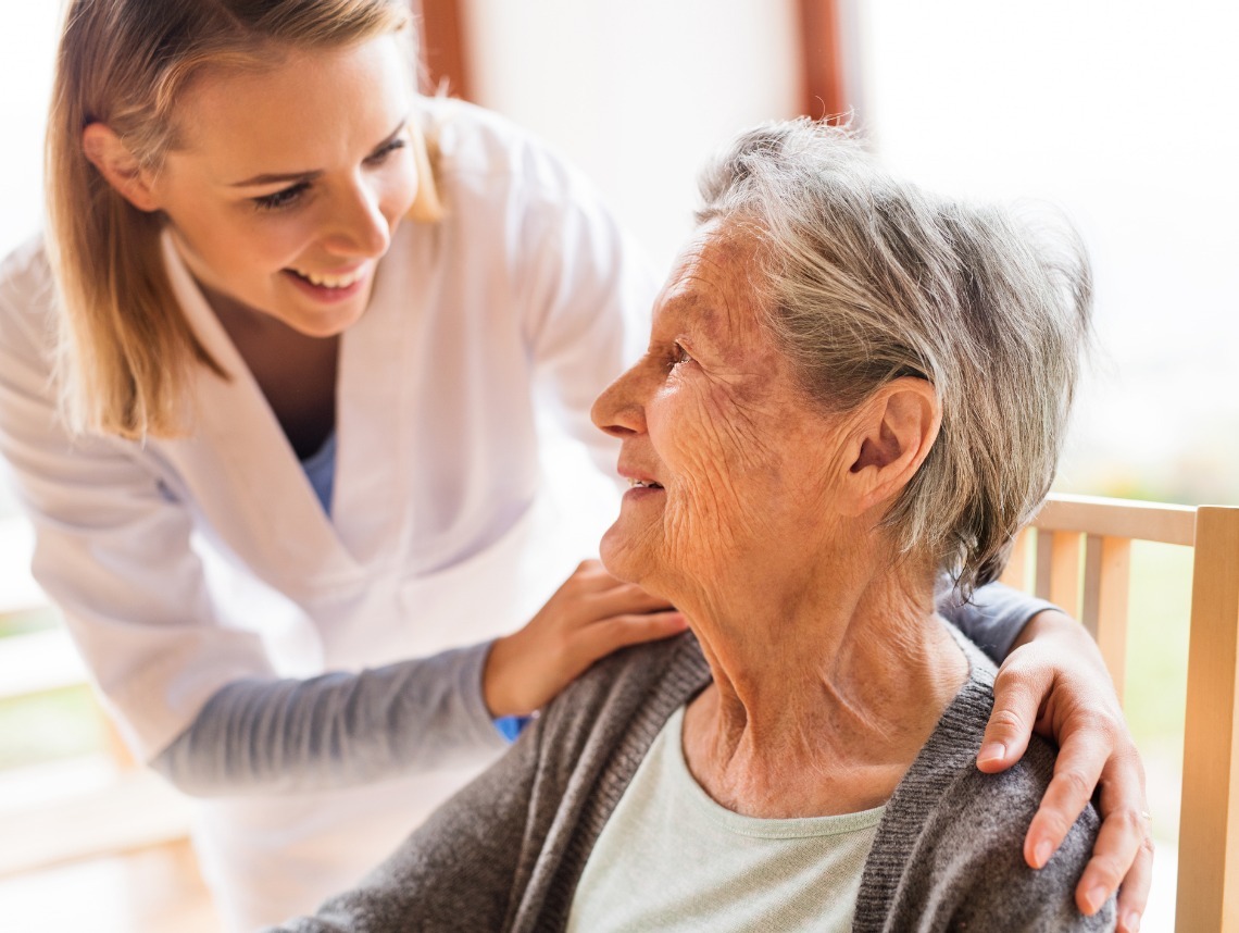 caregiver helping elderly woman create a personalized car plan