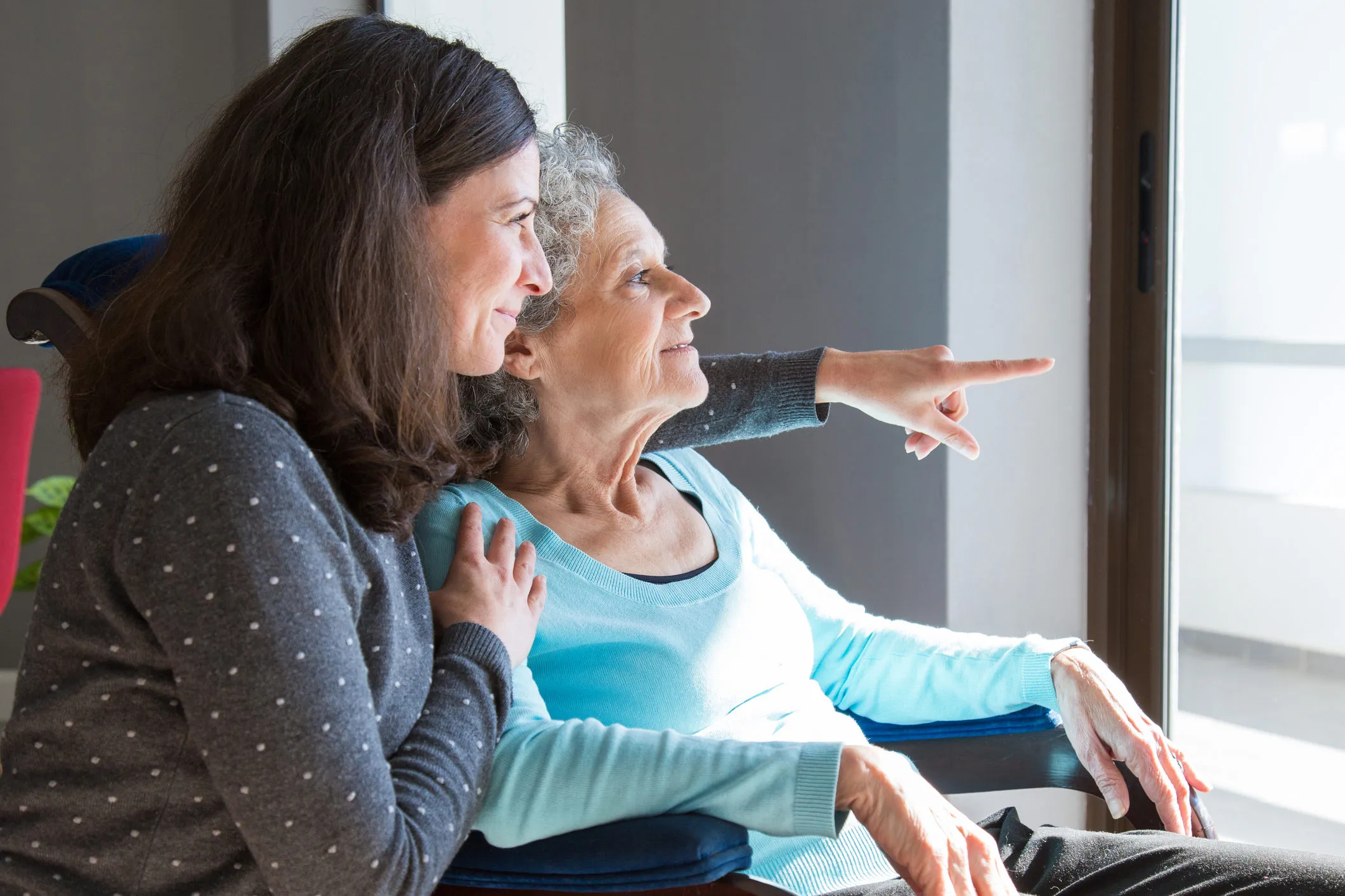 Woman caring for elderly parent