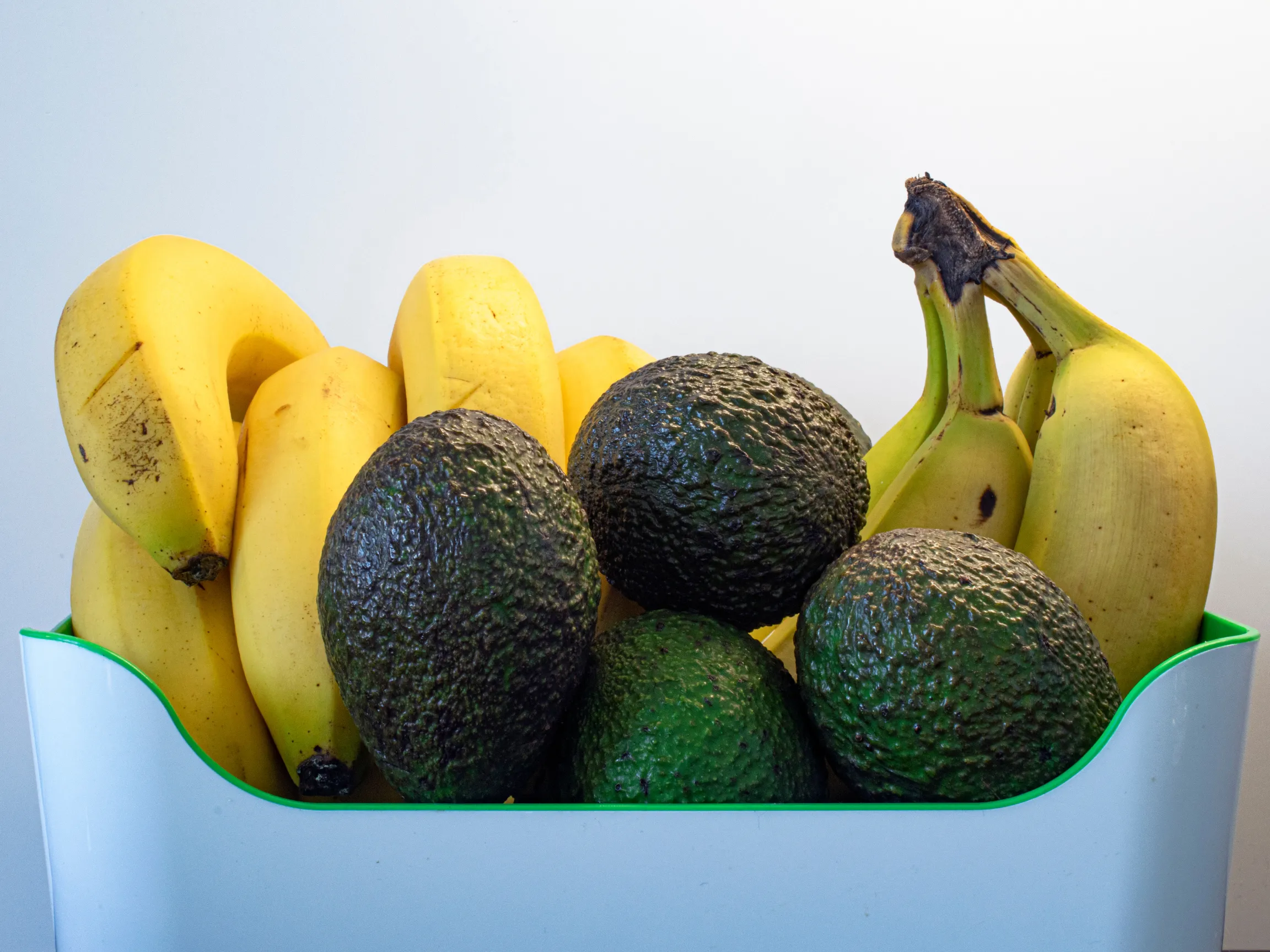 soft food ideas for the elderly - bowl of fruit including bananas and avocados